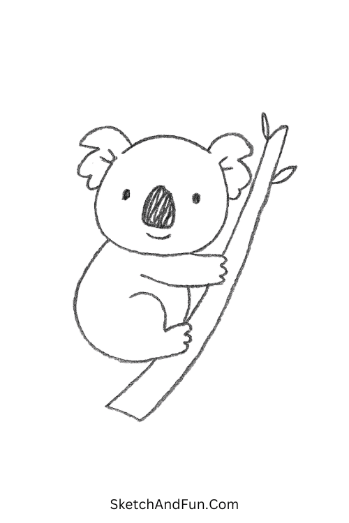 Baby koala on a branch perfect for easy cartoon drawing ideas beginners.