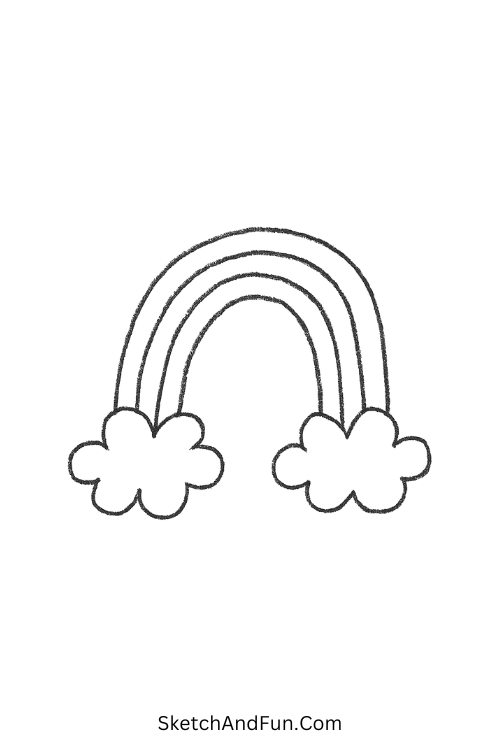 Rainbow with fluffy clouds wonderful for simple drawing tutorials kids love.