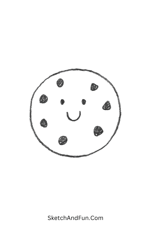 Smiling cookie with chips ideal for simple cartoon drawing ideas for kids.