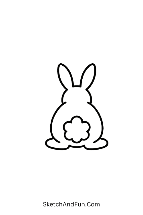 Step by step easter drawing of a bunny seen from the back with fluffy tail