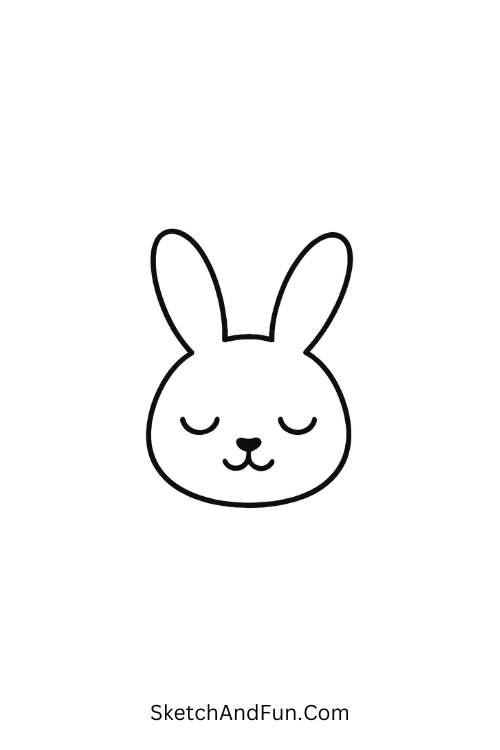 Simple easter bunny drawing with floppy ears and a smiling face