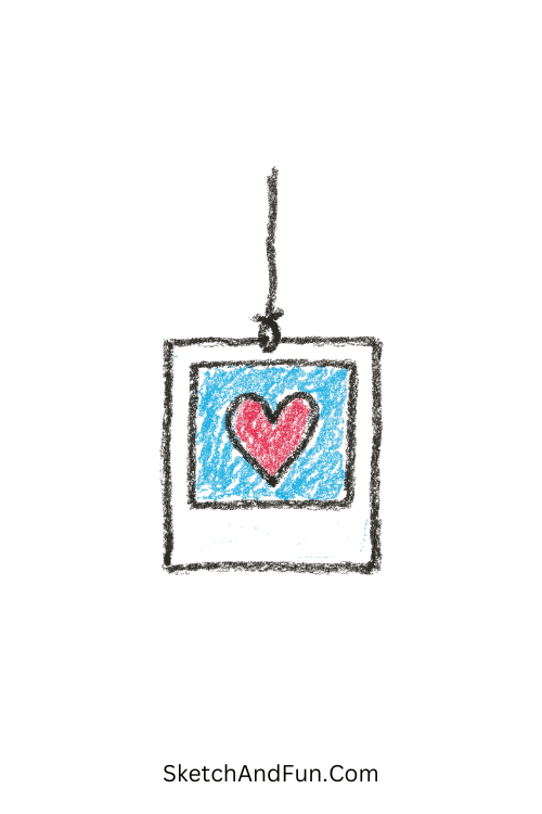 A doodle of a hanging polaroid frame with a heart, notebook margin doodles