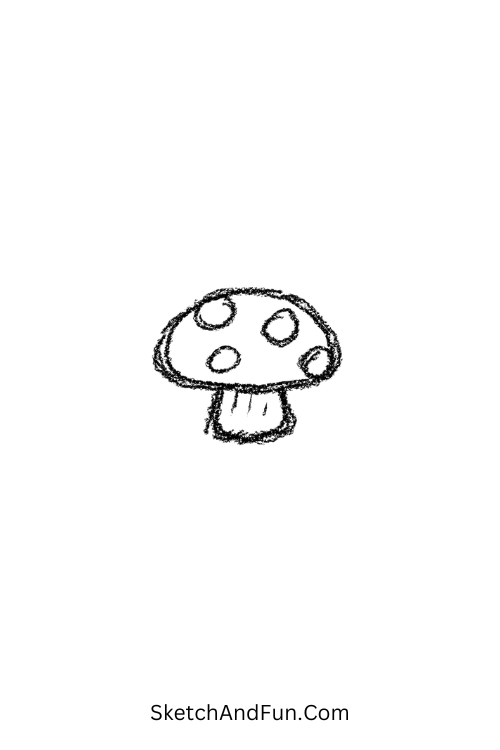 A doodle of a small mushroom with a round cap, aesthetic pen doodles on hand