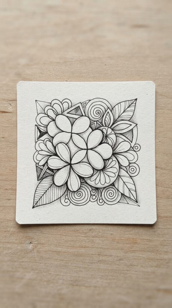 Simple Zentangle shading with graphite shadows and black ink patterns