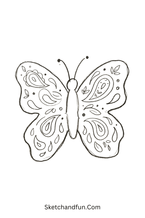 Paisley Zentangle butterfly with layered paisleys, dots, leaves, and intricate wing patterns