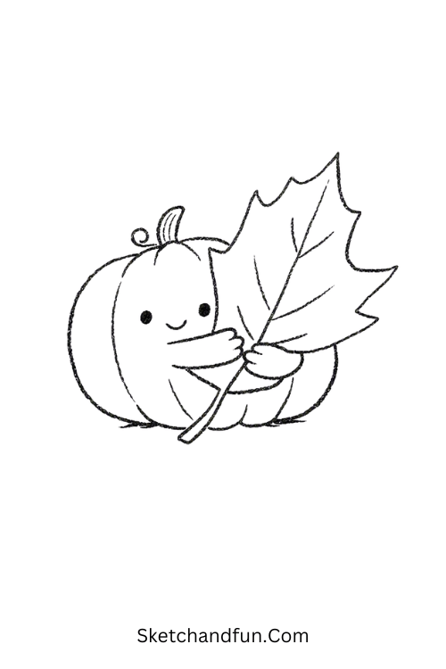 Adorable pumpkin drawing hugging a large autumn leaf