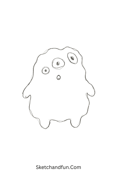 Three-eyed monster Halloween drawing with mismatched eyes